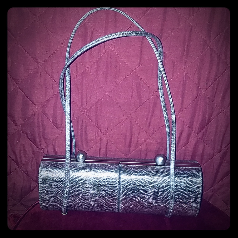 Sondra Roberts silver evening clutch
